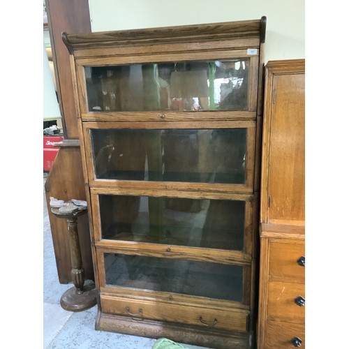 161 - Early to mid 20th C oak globe wernick style full height bookcase with single drawer to the base 86cm... 