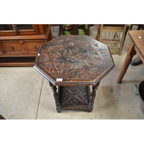 193 - Early to mid C20th oak two tier octagonal carved top occasional table on turned supports