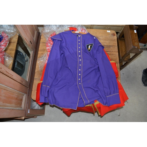 206 - Re-enactors officers red coat with gilt button and a re-enactors tunic (2)