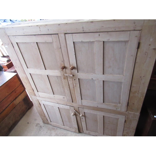 183 - Late Victorian stripped pine house keepers type cupboard with 2 upper paneled cupboard doors above 2... 