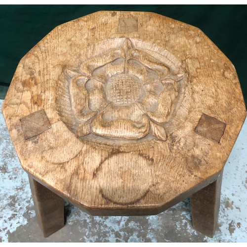 2075A - Thomas Gnomeman Whittaker - oak footstool, twelve sided top carved with a Yorkshire Rose, on three o... 