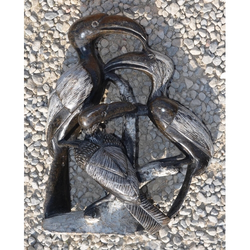 230 - Eastern carved softwood figures of garden Goddess H50cm and another two black figurines (4)