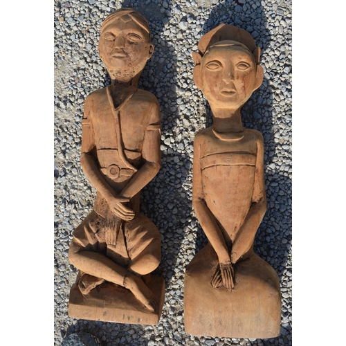 230 - Eastern carved softwood figures of garden Goddess H50cm and another two black figurines (4)