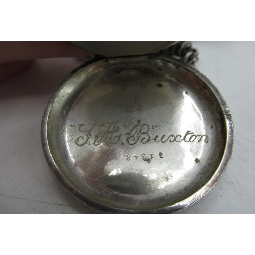 530 - Ladies Swiss silver pocket watch inside engraved “J.A. Buxton,”  stamped 935, on silver chain with c... 