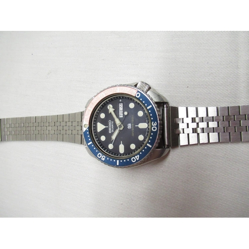 46 - Seiko divers 150m quartz wristwatch with day date, rotating. Stainless steel case with rotating Peps... 