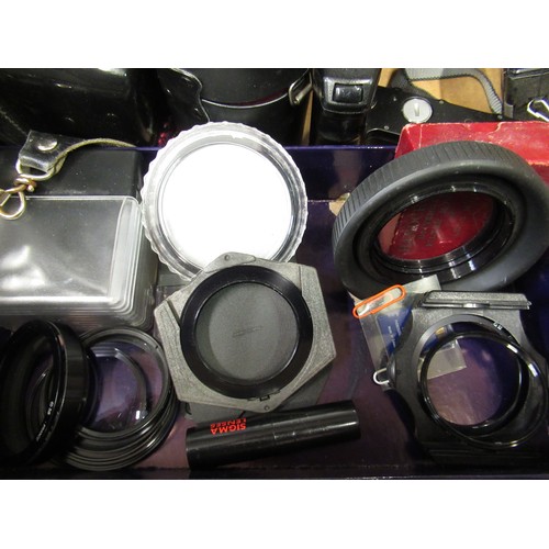 131 - Collection of photographic equipment including: Pentax MX, Hoya 75-260 MM zoom, Cokin filters, Canon... 