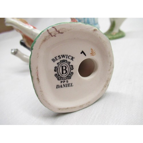 134 - Three Beswick figures incl. Daniel the violin playing pig, Matthew the trumpet playing pig and Beatr... 