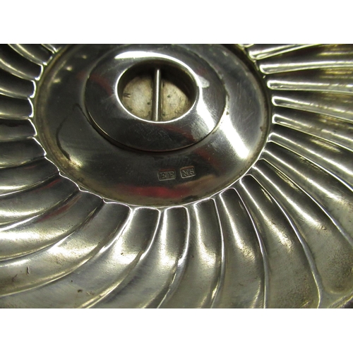 137 - Silver plated shell shaped nut bowl, with decorative scroll shaped squirrel handle. H22cm L26cm