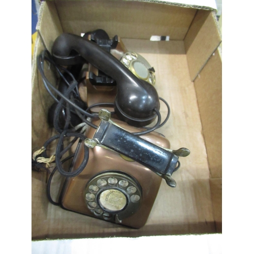 83 - Mid 20th C FTTR continental telephone with copper body and Bakelite handset and a similar one