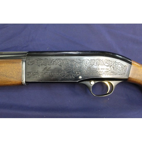 359 - Beretta semi automatic shotgun mod. A.302-calibre12, with painted black engraved stock, 27