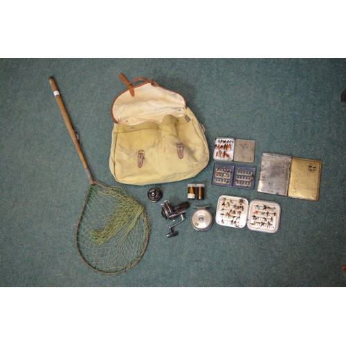 134 - Brady fishing bag with unbranded fly fishing reel, Daiwa course fishing reel, three boxes of flies, ... 