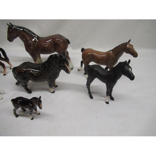 138 - Three Royal Doulton horses and four unmarked horses