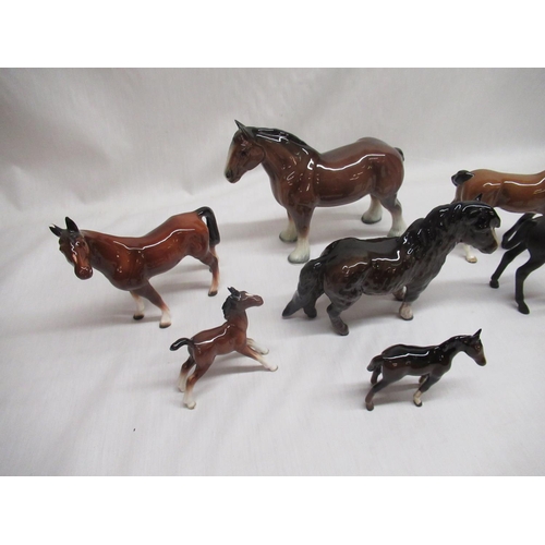 138 - Three Royal Doulton horses and four unmarked horses