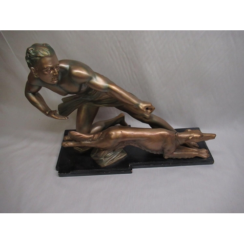37 - Art deco figure of a man and hunting dog