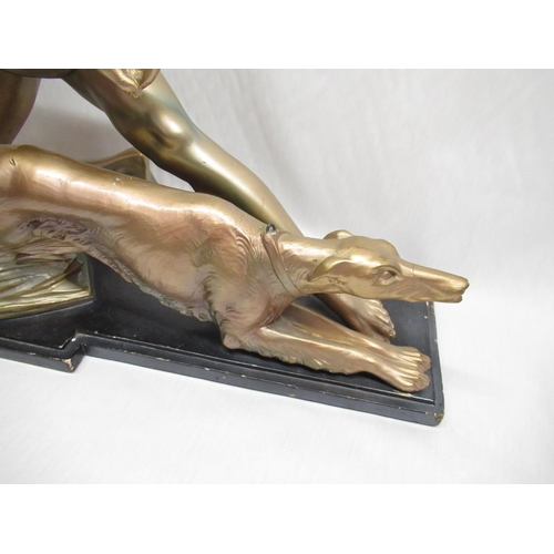 37 - Art deco figure of a man and hunting dog