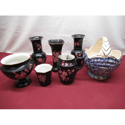 582 - Six pieces of black Carlton Ware with apple blossom design including vases, water jug etc, an Arthur... 
