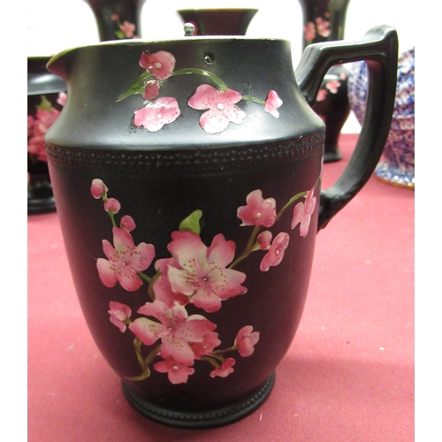 582 - Six pieces of black Carlton Ware with apple blossom design including vases, water jug etc, an Arthur... 