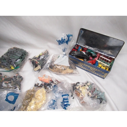 602 - Large collection of assorted toy soldiers, animals, fencing & racing parts and a small tin of Diecas... 