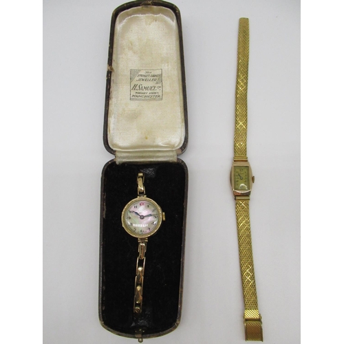12 - 9ct gold Ladies wristwatch with hand wound Swiss made with mother of pearl dial, 15 jewel movement o... 