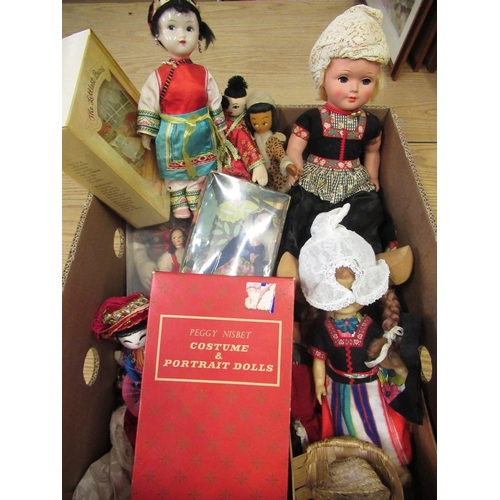 123 - Peggy Nisbet, two boxed costume dolls, and a collection of other costume dolls in national dress