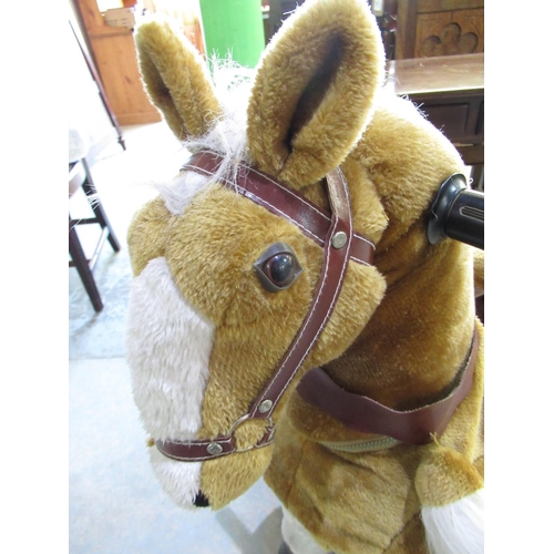 522 - Unusual child's mechanical hobby type horse upholstered in plush finish with rise and fall movement ... 