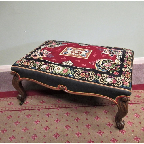 1280 - Large Victorian mahogany framed rectangular stool, with wool work upholstered top on four acanthus a... 