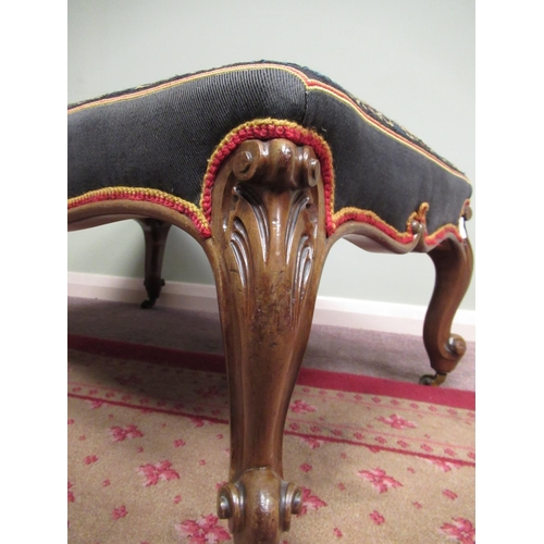 1280 - Large Victorian mahogany framed rectangular stool, with wool work upholstered top on four acanthus a... 