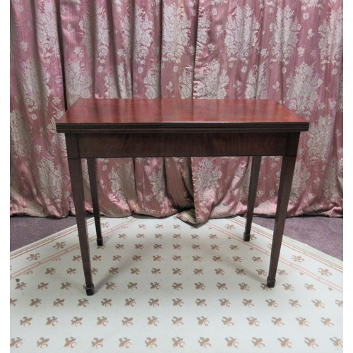 1316 - Geo. III mahogany tea table, moulded folding rectangular top on square tapered supports with splayed... 