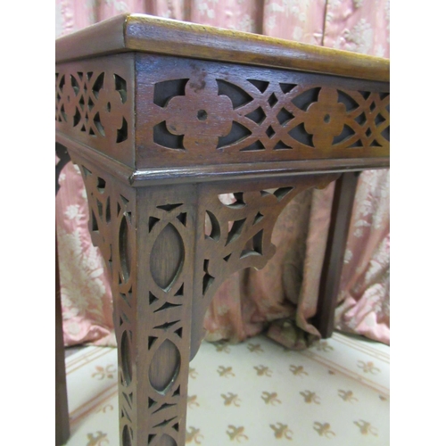 1331 - C20th Chippendale style mahogany rectangular silver table with blind fret carved frieze and square s... 