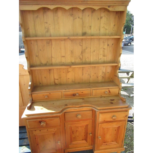 705 - Victorian pine dresser, three tier back with three spice drawers, the inverted break front base with... 