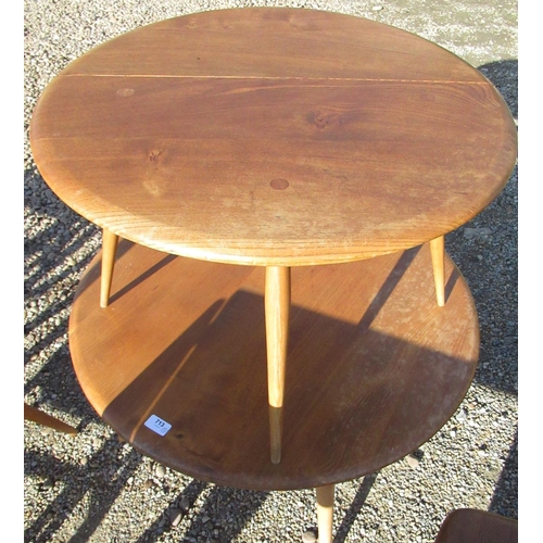 713 - Ercol light elm coffee table, circular top on three turned outsplayed supports D75cm H43cm, and simi... 