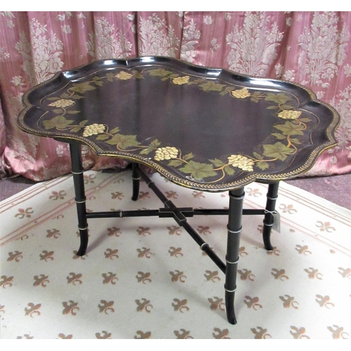 1428 - Victorian style papier mache tray table, shaped rectangular top decorated with vines, on faux bamboo... 