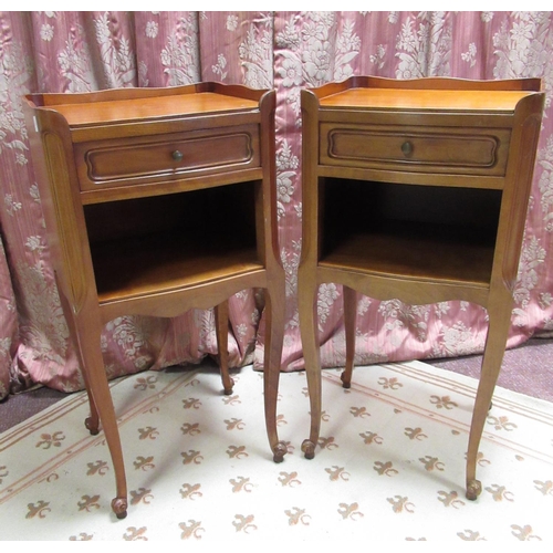 1188 - Pair of C20th French bedside cabinets, galleried tops and single drawers above recess on angular cab... 