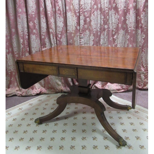 1340 - Regency mahogany sofa table in the style of William Trotter of Edinburgh, cross banded top with two ... 