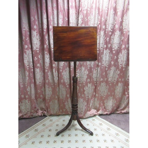 1299 - C19th mahogany music stand, adjustable slope top with two brass candle branches on adjustable taperi... 