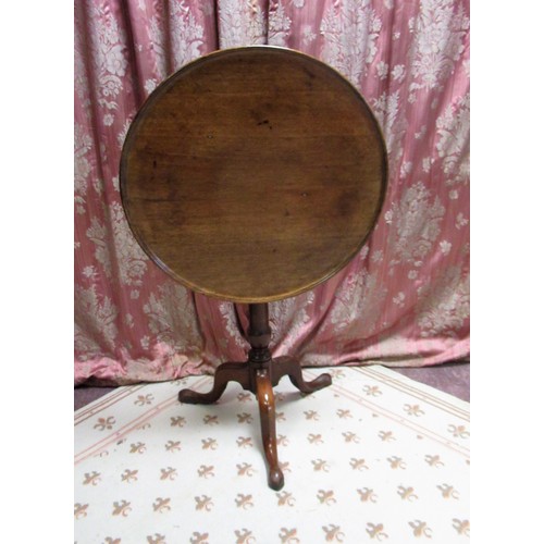 1323 - Geo. III mahogany tripod tea table, circular moulded snap top on ring turned tapering supports with ... 