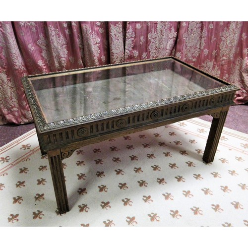 1162 - Chippendale revival rectangular bijouterie table with inset glass top, moulded edge and reeded friez... 