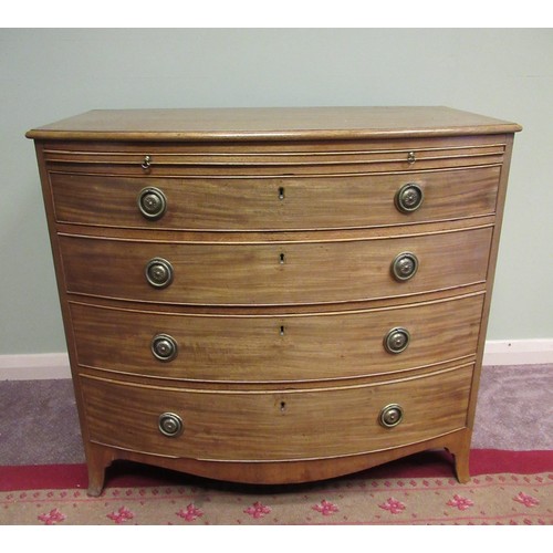 1445 - C19th bow front mahogany dressing chest, with brushing slide above four long graduated cockbeaded dr... 