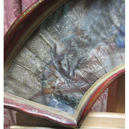 1248 - Early C19th French fan, painted with figures in a rural garden landscape, with silvered cut paper de... 