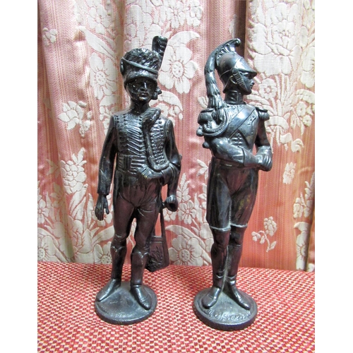 1379 - Pair of C20th cast bronze models of an Hussar and an Infantryman in typical uniform, on circular bas... 