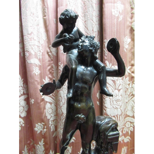 1378 - After the Antique, cast bronze model of a Satyr  supporting the infant Bacchus H38cm, on black and w... 