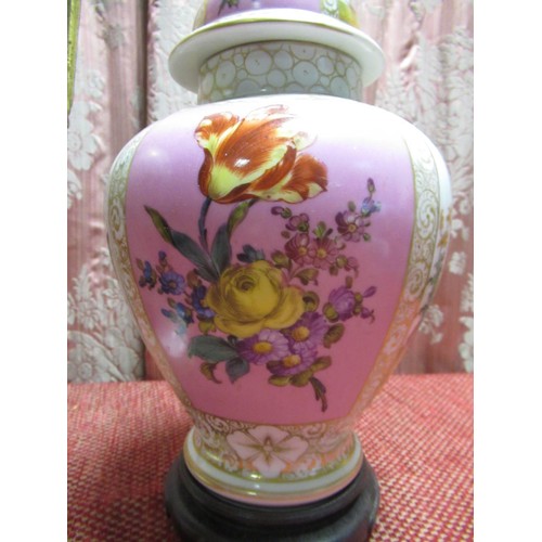 1122 - French porcelain table lamp, the urn shaped body painted with a profuse floral spray in a reserve pa... 