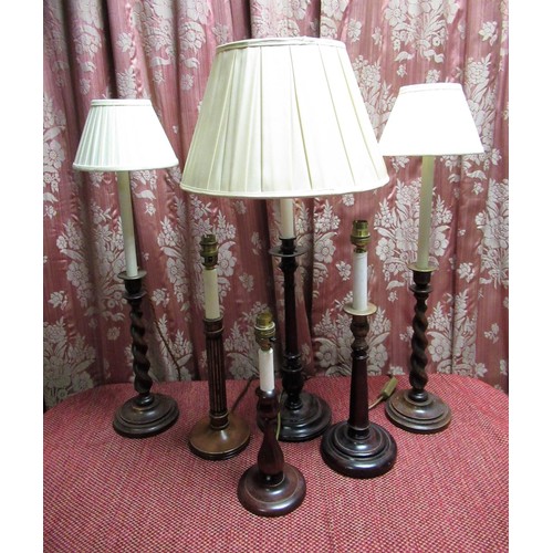 1223 - Pair of oak barley twist column candlestick table lamps H56cm, a similar lamp with plain turned colu... 