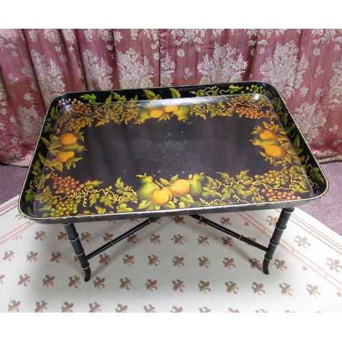 1427 - Regency style papier mache tray table, rectangular galleried top decorated with fruit, the faux bamb... 