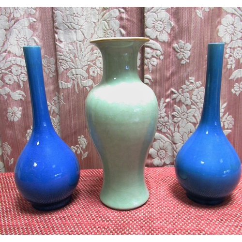 1523 - Chinese Celadon glazed baluster shaped vase, and a pair of blue glaze bottle shaped vases, all H25cm... 