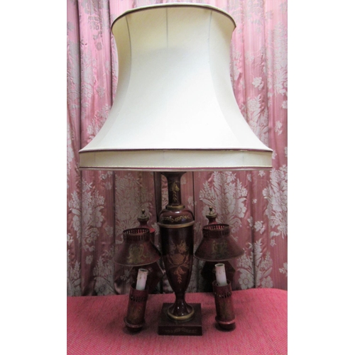 1388 - Regency style red toleware urn shaped table lamp on square base with shade and two similar wall ligh... 