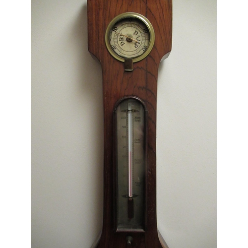 1045 - C19th rosewood wheel barometer/thermometer, swan necked pediment with brass urn finial above four si... 