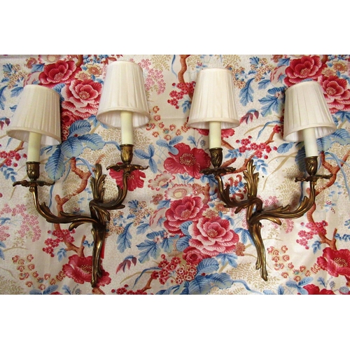 1213 - Three pairs of Rococo style cast gilt metal two branch wall lights, with shades (6)