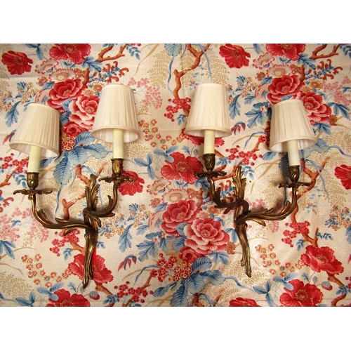 1213 - Three pairs of Rococo style cast gilt metal two branch wall lights, with shades (6)