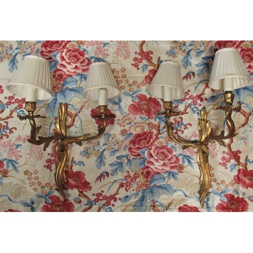 1213 - Three pairs of Rococo style cast gilt metal two branch wall lights, with shades (6)